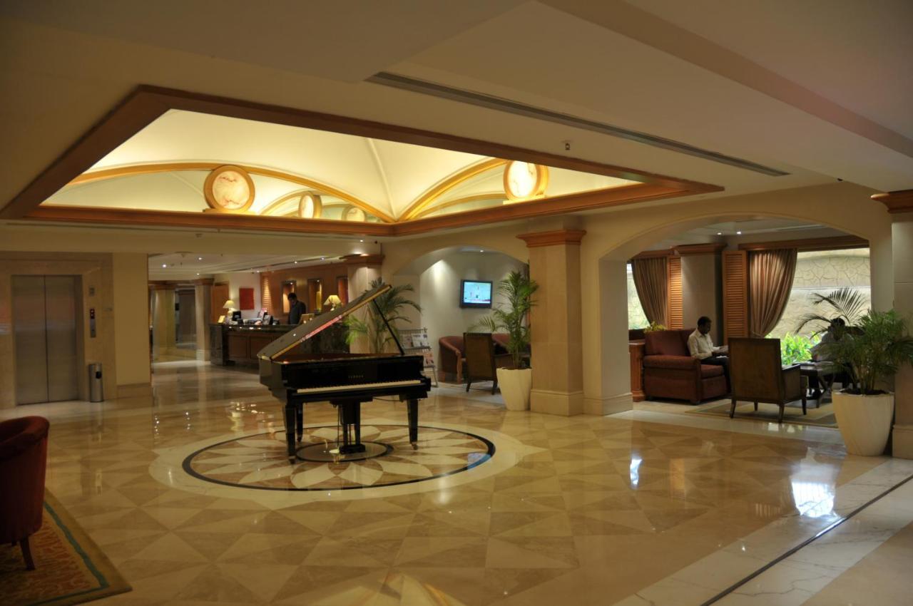 Hotel Ramada Plaza By Wyndham Palm Grove Bombay Esterno foto Lobby