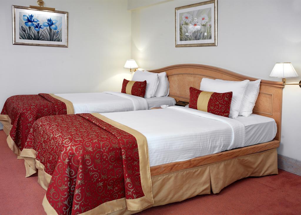 Hotel Ramada Plaza By Wyndham Palm Grove Bombay Esterno foto A guest room at the hotel